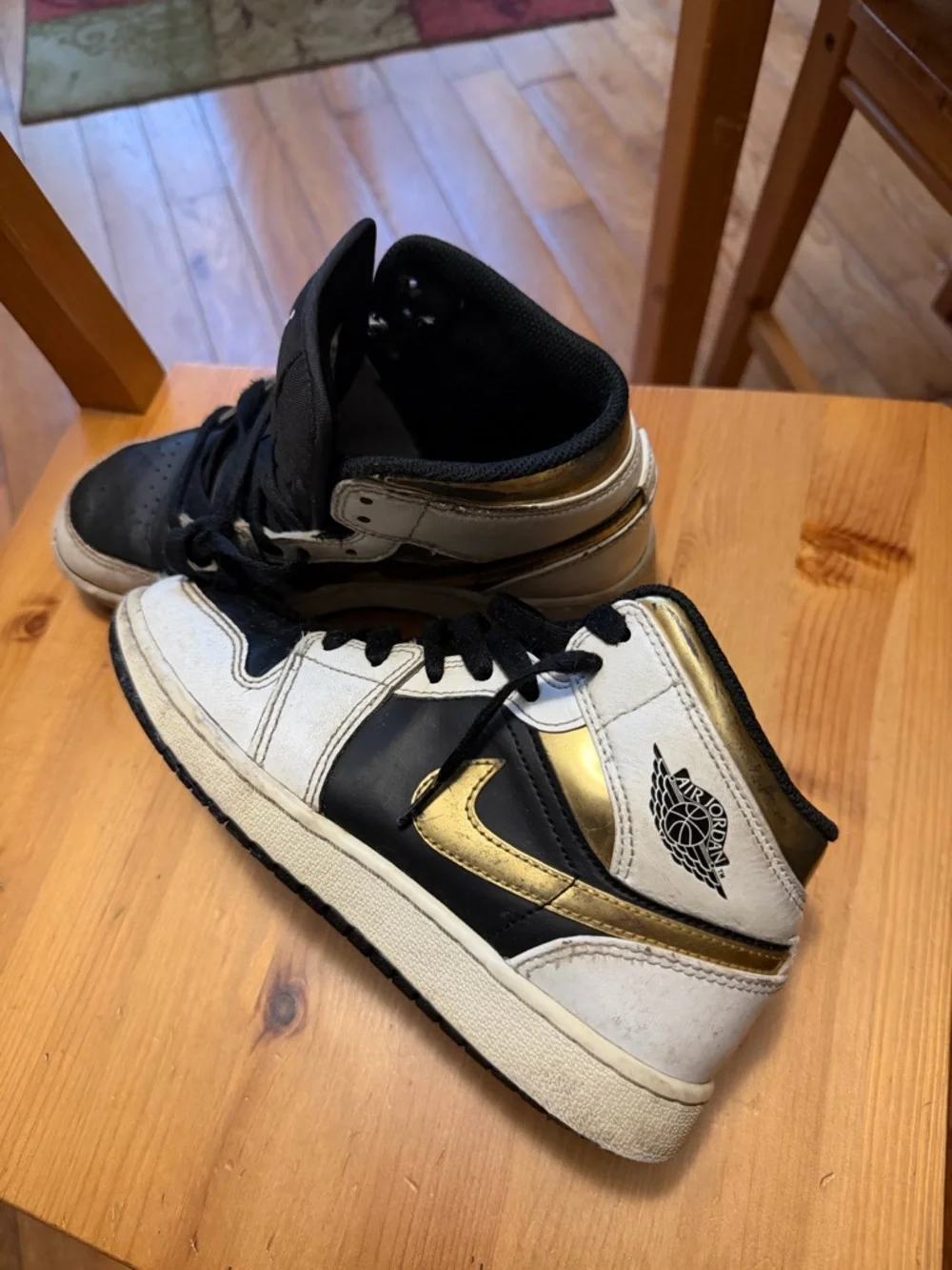 Boys Nike Black White Gold Jordan 1 Mid Sneakers